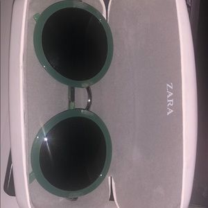 Zara doing sunglasses